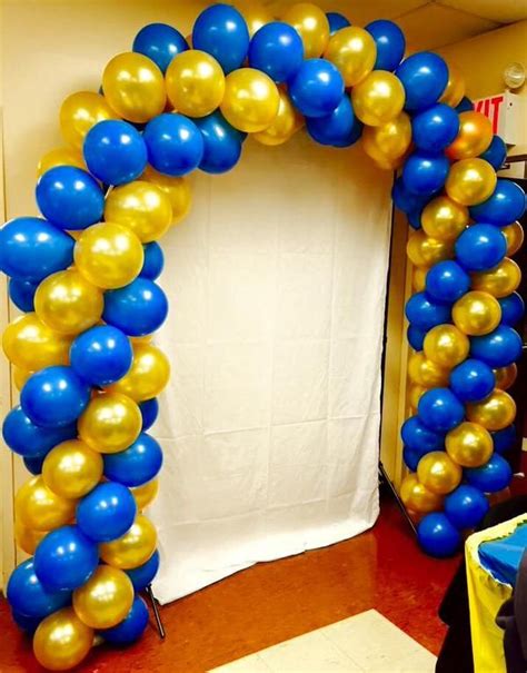 balloons gold and blue|blue and gold balloon columns.